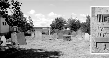  ?? — Submitted photos ?? The grave (at right) is at the centre of a mystery in the Roman Catholic cemetery (above) in Harbour Grace. The mysterious grave has no names associated with it and The Telegram is asking for readers’ help to learn more about the grave.