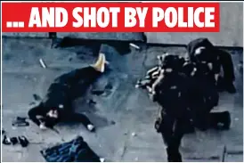  ?? ?? GUNNED DOWN: Khan lies on the ground after being shot by police ... AND SHOT BY POLICE