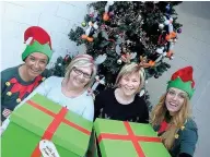  ??  ?? An Elfie Selfie Elizabeth Arbuckle (left), Eveline McNair, Sandra Markey and Asda Colleague Georgie Bourne