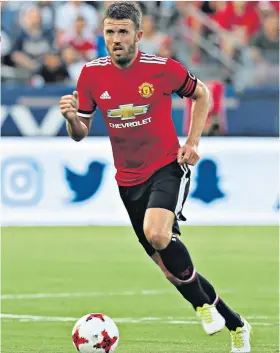  ??  ?? On the mend: Michael Carrick hopes to return for United within a fortnight