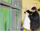  ?? Christian Abraham/Hearst CT Media file photo ?? Ana da Silva, of Milford, feeds bottles into a recycling machine at Stop & Shop in Stratford in 2017.
