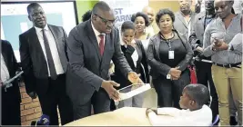  ?? PHOTO: THULANI MBELE ?? Premier of Gauteng David Makhura with MEC of education Panyaza Lesufi at the new school in Braamfisch­erville.