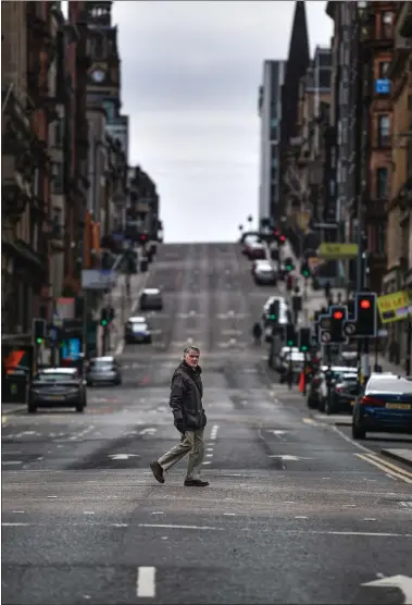  ??  ?? The streets were like ghost towns during lockdown in April, such as St Vincent Street, Glasgow