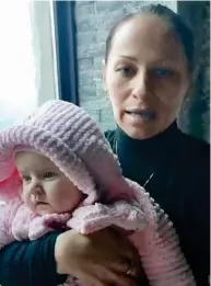  ?? ?? Grateful: Yulia and her baby daughter