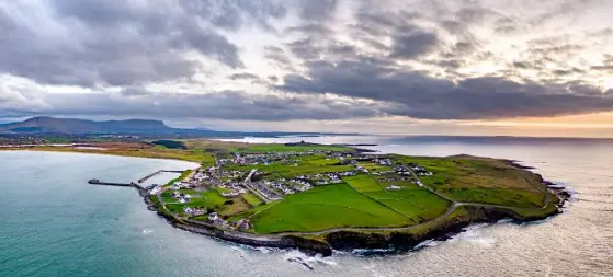  ??  ?? Mullaghmor­e Head, Co Sligo, on the Wild Atlantic Way — but it still isn’t clear how to bring tourists back to parts of Ireland like this