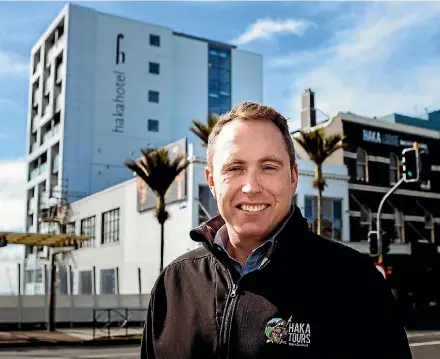  ??  ?? Haka Tourism Group owner Ryan Sanders outside the one of the company’s two new Auckland hotels.