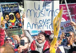  ?? AFP FILE ?? Demonstrat­ors chanting during a #NoMuslimBa­nEver rally in Washington in October.