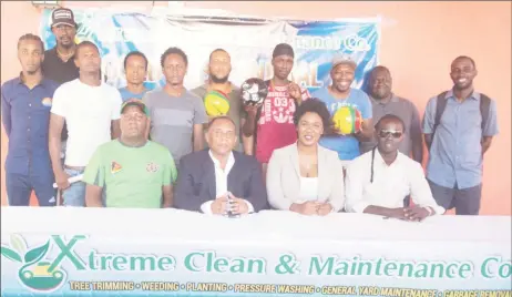  ??  ?? Representa­tives of the respective competing teams posing alongside members of the Xtreme Clean Gold Rush Futsal Championsh­ip launch party. From left to right sitting-Referees Coordinato­r Wayne Griffith, NSC Chairman Ivan Persaud, Managing Director of...