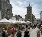  ??  ?? Market stalls in the town of Keswick