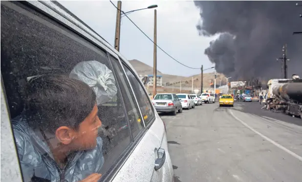 Fear and hope for Iranians trapped between bombs and defiant rulers -  PressReader