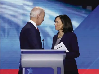  ?? WIN MCNAMEE Getty Images/TNS ?? Former Vice President Joe Biden and Sen. Kamala Harris of California speak after the Democratic Presidenti­al Debate at Texas Southern University on Sept. 12, 2019, in Houston. Only two other women have ever been running mates on a major party presidenti­al ticket.