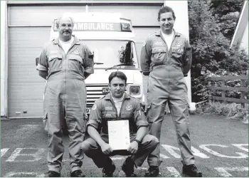  ?? B28twe02 ?? Dougie Henderson, an ambulance technician for four-and-a-half years, has qualified as an ambulance paramedic. He is pictured with fellow paramedics Jeff Dawson and Neil Gillies.