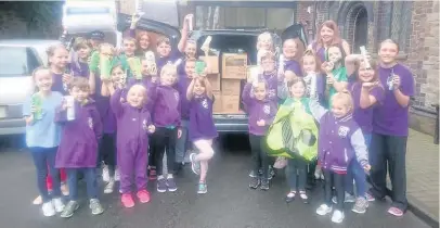  ??  ?? YOUNGSTERS of Haddon School of Performing Arts have been raising awareness of the homeless issues facing their community.
Each year the school, based in Hartshill, chooses to support a charity for its Christmas appeal and this year it chose Doorway, a...