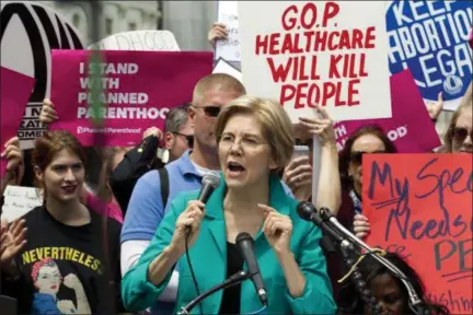  ?? JOSE LUIS MAGANA — ASSOCIATED PRESS ?? U.S. Sen. Elizabeth Warren, D-Mass,. speaks during a demonstrat­ion Thursday on Capitol Hill in Washington.