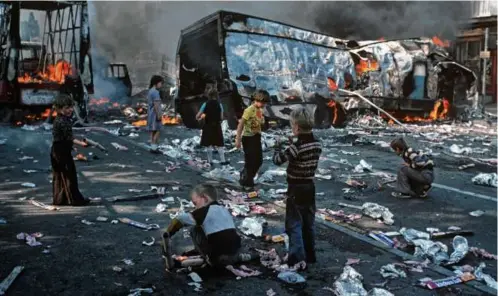  ?? ALAMY/ALAIN LE GARSMEUR ?? The morning after a night of riots in Belfast in 1976.