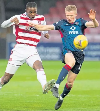  ??  ?? Hamilton’s Hakeem Odoffin, left, tries to win possession from County’s Stephen Kelly.