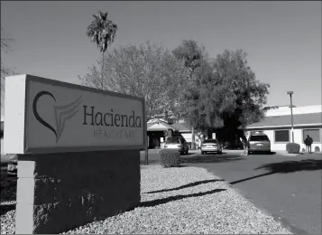  ?? AP PHOTO/ROSS D. FRANKLIN ?? THIS FRIDAY, JAN. 4, PHOTO shows Hacienda HealthCare in Phoenix. The revelation that a Phoenix woman in a vegetative state recently gave birth has prompted Hacienda HealthCare CEO Bill Timmons to resign, putting a spotlight on the safety of long-term care settings for patients who are severely disabled or incapacita­ted.