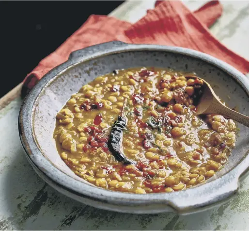  ?? ?? COMFORT FOOD: Chana ko dal is a cheap source of protein in Nepal and has an extra layer of flavour with the onions being well caramelise­d.