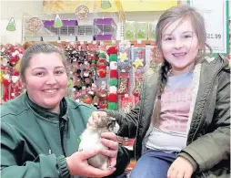  ??  ?? Pals Orla Fox with Ashleigh McKerman, from Pets At Home, and little Max