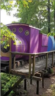  ?? BILL RETTEW JR. — FOR DIGITAL FIRST MEDIA ?? A train treehouse chugs along at amusement park Treehouse World near West Chester.