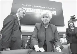  ?? Jim Lo Scalzo European Pressphoto Agency ?? FED CHAIRWOMAN Janet L. Yellen prepares to testify before a House committee. She confirmed that an interest rate increase could come in December.