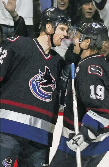  ?? JEFF VINNICK/GETTY IMAGES ?? Daniel Sedin, pictured with Markus Naslund in 2006, says Naslund was ‘an idol growing up.’ Sedin tied Naslund’s franchise goals mark of 346 in Monday’s 3-2 overtime win against the Florida Panthers.