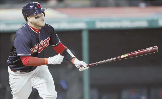 ?? AP PHOTO ?? THINGS ARE LOOKING UP: Roberto Perez watches his home run in the eighth inning that boosted the Indians to a 2-1 victory against the Tigers last night in Cleveland.