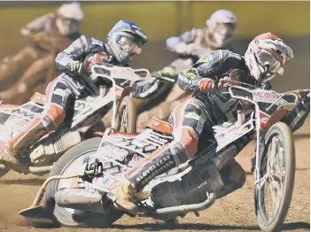  ??  ?? Panthers captain Ulrich Ostergaard leads the way in heat five against Rye House.