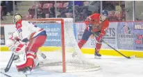  ?? JASON SIMMONDS • SALTWIRE NETWORK ?? Valley Wildcats forward Cam Henderson controls the puck behind Summerside D. Alex MacDonald Ford Western Capitals goaltender Felix-Anthony Ethier in the first period of a Maritime Junior Hockey League game in Summerside on Feb. 20.