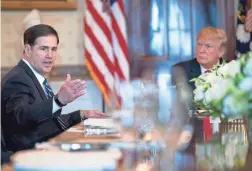  ??  ?? While Arizona Gov. Doug Ducey, shown with President Donald Trump in May, has said he doesn’t want to see children separated from parents, he has not denounced the Trump administra­tion’s “zero tolerance” policy.