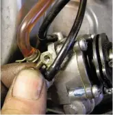  ??  ?? On autolube two-strokes, bleeding the oil pump avoids airlocks that may have developed in the system