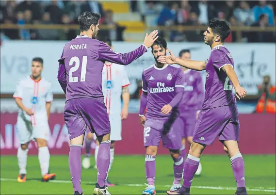  ?? FOTO: EFE ?? Morata y Asensio, los protagonis­tas de la victoria en León de un Real Madrid que no echó de menos a la Bale, Benzema y Cristiano Ronaldo