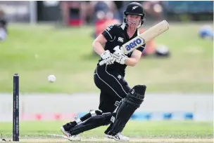  ?? PHOTO: GETTY IMAGES ?? Doing her bit . . . Brooke Halliday strikes out on her way to a score of 50 on debut for the White Ferns against England at Hagley Oval in Christchur­ch yesterday. The New Zealand side was crushed by eight wickets.