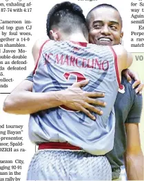  ??  ?? Lyceum's Jaycee Marcelino hugs Pirates coach Topex Robinson after a heartstopp­ing 94-92 victory over Arellano University yesterday in NCAA basketball at the Filoil Flying V Centre in San Juan. (Rio Leonelle Deluvio)
