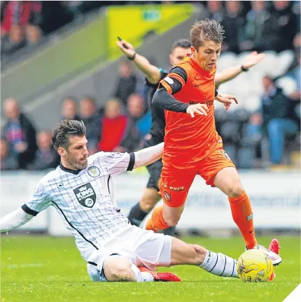  ??  ?? Rocco Quinn of St Mirren fails to get the better of United’s Charlie Telfer.