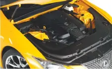  ??  ?? The LC500 flirts with supercar status thanks to its 471hp V-8. AUTOart gives us plenty to look at, with visible cylinder heads, engine plumbing, and gorgeous scale hood hinges.