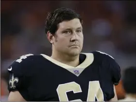  ??  ?? In this Aug. 10, file photo, New Orleans Saints tackle Zach Strief (64) stands on the sideline during the second half of an NFL preseason football game against the Cleveland Browns, in Cleveland. Strief says he’s retiring after 12 NFL seasons. Strief, who made a tearful announceme­nt on Monday, in Metairie, La., says his career far exceeded his expectatio­ns. AP PHOTO/RON SCHWANE