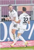  ?? AFP ?? Union Berlin’s Marcus Ingvartsen, right, celebrates with teammate Robert Andrich.