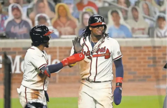  ?? JASON GETZ/USA TODAY SPORTS ?? The Braves will be heavy favorites to win a fourth consecutiv­e NL East title in 2021.