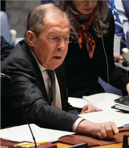  ?? ?? Russia's foreign minister Sergey Lavrov, serving as the president of the Security Council gavels in a meeting of the U.N. Security Council, at United Nations headquarte­rs. Photo: John Minchillo, AP