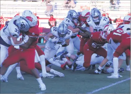  ?? PHOTOS BY KEVIN LOZON — FOR MEDIANEWS GROUP ?? Dakota running back Caiden Sloan (22) played a big role in the Cougars’ 29-20 MAC Red Division victory over Chippewa Valley Friday night.