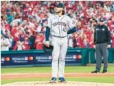  ?? DOUG MILLS/THE NEW YORK TIMES ?? Astros’ Lance McCullers checks the scoreboard after giving up a homer in Game 3 on Tuesday. Game 6 was not finished in time for this edition.