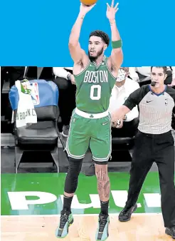  ?? — USA TODAY SPORTS ?? Celtics forward Jayson Tatum launches a jumper against the Bucks.