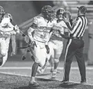  ?? JOHN MERSITS/SOUTH BEND TRIBUNE ?? Northwood players celebrate one of Nitro Tuggle’s (3) two touchdowns against Saint Joseph on Friday at Father Bly Field in South Bend.