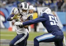  ?? JAMES KENNEY / ASSOCIATED PRESS ?? Rams running back Todd Gurley rushed for 118 yards and had 158 receiving, with two catches for touchdowns. The Rams totaled 402 yards in beating the Titans.