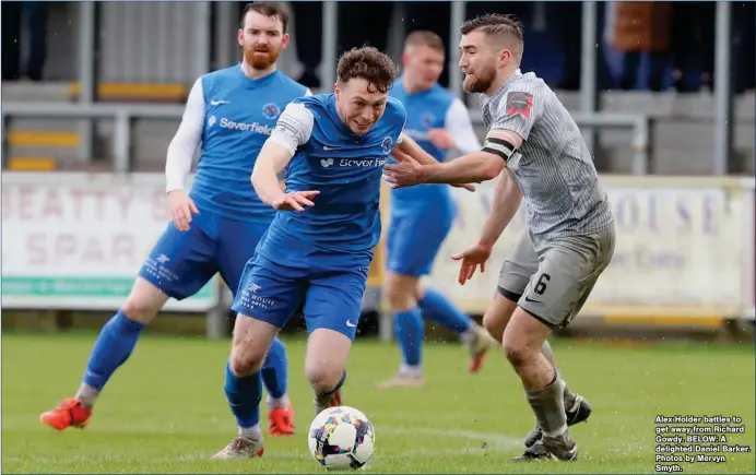  ?? ?? Alex Holder battles to get away from Richard Gowdy. BELOW: A delighted Daniel Barker. Photos by Mervyn Smyth.