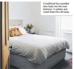  ??  ?? A traditiona­l four-panelled door leads into the main bedroom. A radiator and carpet keep the cold away.