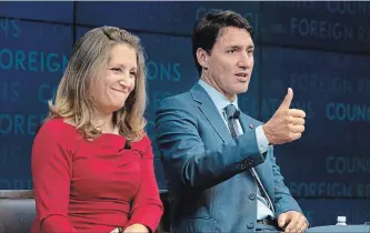  ?? ADRIAN WYLD THE CANADIAN PRESS ?? Foreign Affairs Minister Chrystia Freeland and Prime Minister Justin Trudeau skipped the diplomatic mayhem of Trump Day at the United Nations to attend a gathering of New York’s Council on Foreign Relations Tuesday.