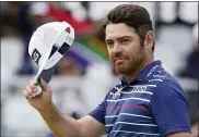  ?? JAE C. HONG — THE ASSOCIATED PRESS ?? Louis Oosthuizen, of South Africa, tips his cap after finishing on the 18th green during the final round of the U.S. Open Golf Championsh­ip, Sunday at Torrey Pines Golf Course in San Diego.