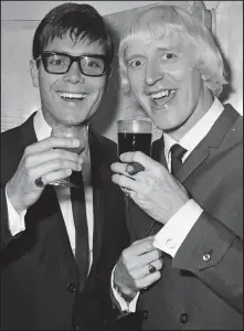  ??  ?? No link to probe: Sir Cliff with Savile at an awards in 1965